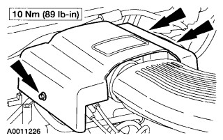 Disconnecting EGR pressure sensor electrical connector on 2000 Ford Expedition for replacement due to OBD2 code P0401.