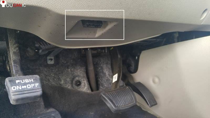 2017 Kia Sedona dashboard area indicating the typical OBD2 port location under the driver's side dashboard, near the fuse box cover.