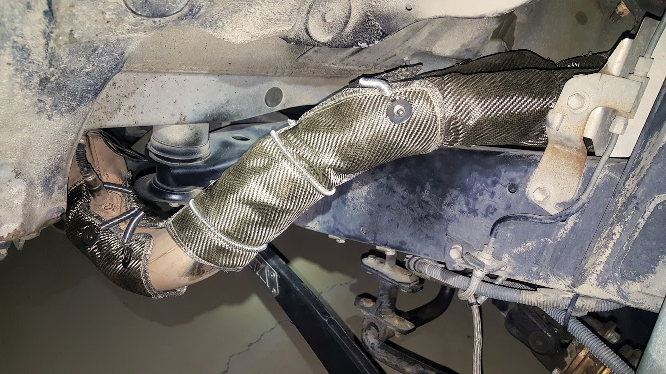 Exhaust heat blankets installed on 80 series Land Cruiser catalytic converter to improve O2 sensor efficiency and fuel economy