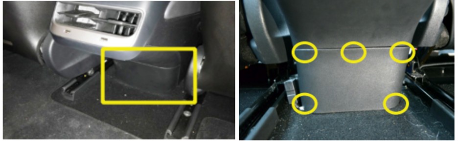 Using an Allen wrench to begin removing the rear center console panel to access the 2024 Model 3 OBD2 port.