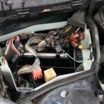 Engine compartment fuse box location in a BMW 5-Series (E39, 1996-2003)