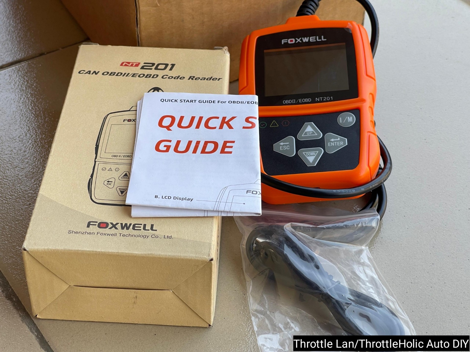 Foxwell NT201 OBD2 Scanner - What's in the Box