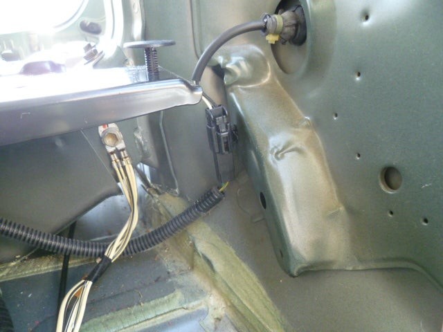 Close-up of Toyota wheel speed sensor wiring and connector