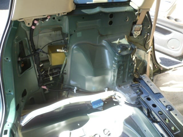 Rear hatch view of Toyota interior for wheel speed sensor access