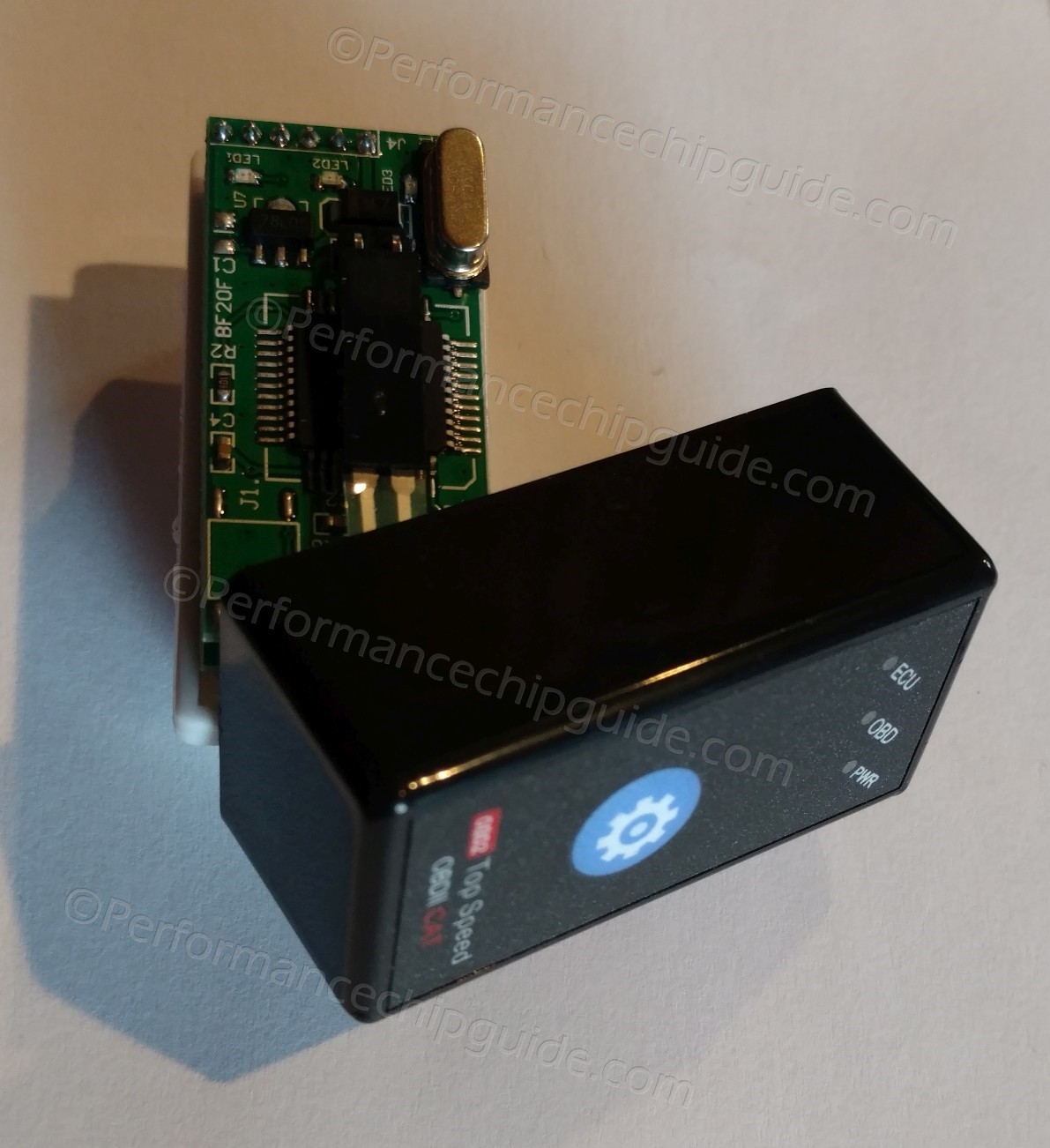 Internal components of the disassembled Thorton Top Speed OBDII Cat Performance Chip, exposing the simple circuit board and LEDs.