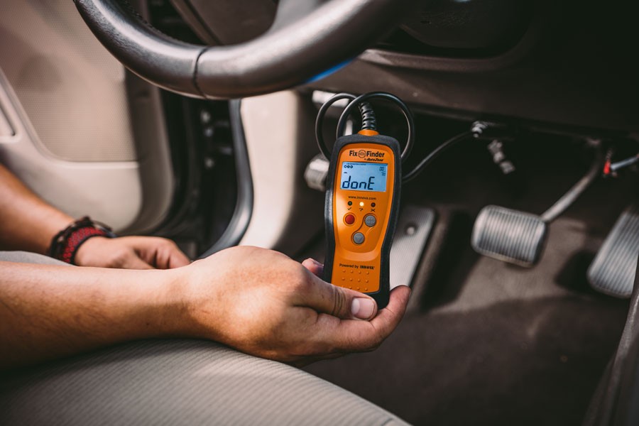 Driver's side dashboard area where OBD2 port is commonly located